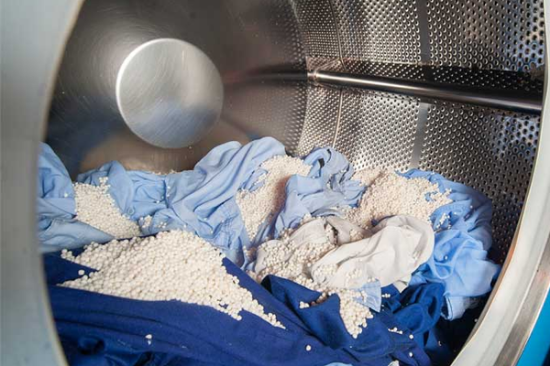 Textile pre-treatment wetting and washing product
